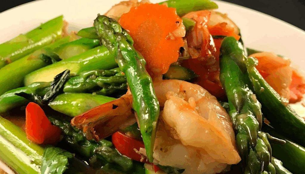 Prawns Asparagus · Prawns stir-fried with fresh Asparagus, Red Bell Peppers, Basil Leaves in Chili and Garlic Sauce.