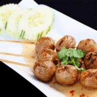 Grilled Meat Balls · Grilled meatballs topped with sweet chili sauce.