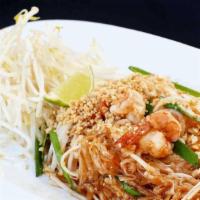 Pad Thai · Traditional Thai style pan-fried skinny rice noodle, egg, tofu, bean sprout and peanut.