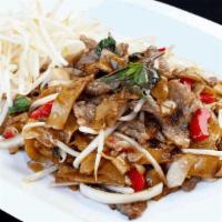Pad Kee Mow · Spicy pan-fried flat noodle with basil, bell peppers, bean sprout, yellow onion.
