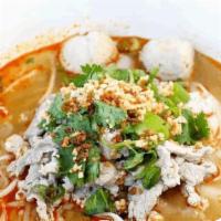 Pork Tom Yum Noodle Soup · Medium spicy and sour noodle soup with ground pork, pork meatballs, sliced fish cake, bean s...