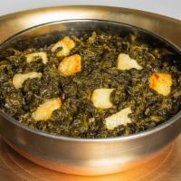 Palungo Paneer (V) · Fried home made paneer cooked with fresh spinach leaves sauteed with dry chili and garlic. V...