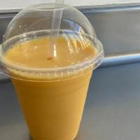 Mango  Lassi · Nepalese Mango smoothie with a hint of Cardamom.