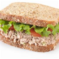 Tuna Salad Sandwich · Tuna salad, iceberg, lettuce, tomato and cheese, and your choice of bread.