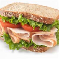 Turkey Sandwich · Turkey, iceberg, lettuce, tomato and cheese, and your choice of bread.