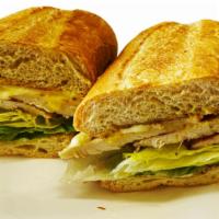 Honey Mustard Chicken · Tender chicken breast, Swiss cheese, lettuce, and onions on a French roll.