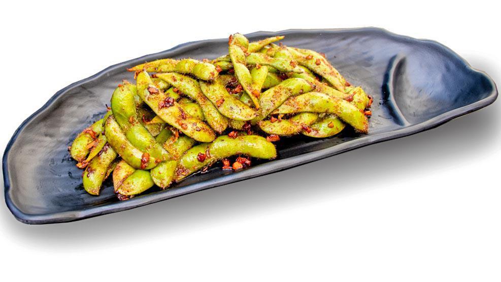 Garlic Edamame · Vegetarian.Soybeans in the pod, steamed and served with soy sauce, garlic and seasoning.
