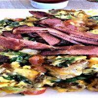 The Tree House Country Scramble · Potatoes with eggs scrambled country style with garlic, sweet bell peppers, scallions, tomat...