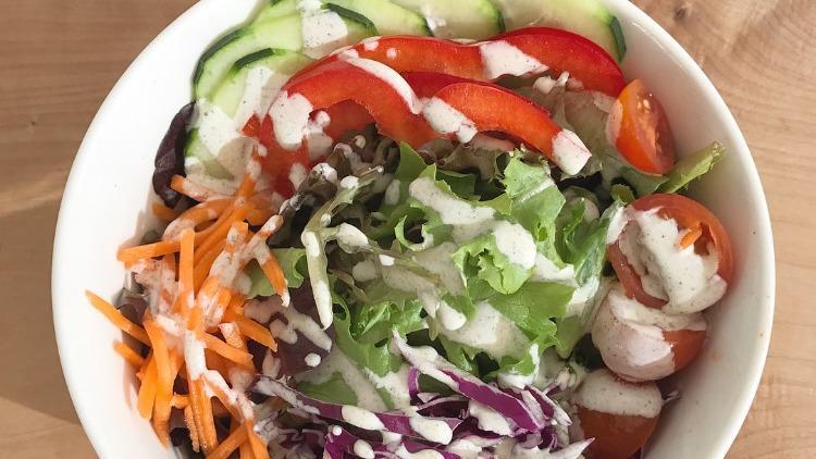 Side Salad · Mixed greens, carrots, cucumber, red bell pepper, cabbage, and tomatoes.