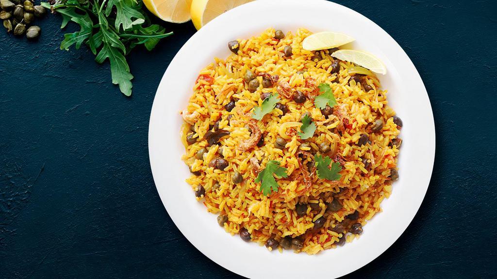 Hyderabadi Vegetable Biryani (HVB) · Fresh vegetables and basmati rice cooked in a traditional hyderabadi style, flavoured with saffron and served with raita and mirchi-ka-salan.