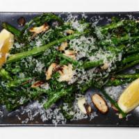 Broccolini. · shaved parmigiano, toasted garlic, olive oil, sea salt