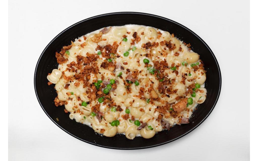 Adult Mac & Cheese. · Mac & Cheese with prosciutto, peas, and breadcrumbs
