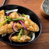 Butter Fried Chicken Wings · wok tossed in butter, garlic, onion,
jalapeños