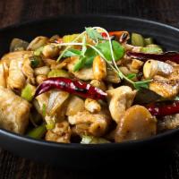 Kung Pao Chicken · Chicken breast, onion, water chestnut, dry chili pepper, and roasted peanuts.