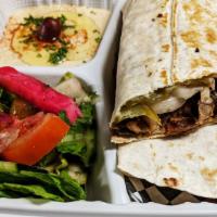 Chicken Shawarma Wrap · Lettuce, tomatoes, pickles, tahini and garlic sauce.