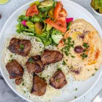 Lamb Kebob Plate · Served with hummus, rice, salad and pita bread.