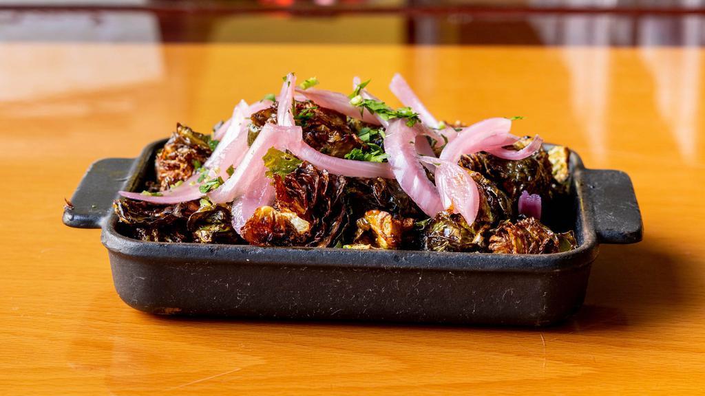 Brussels Sprouts · Pickled onions and aged balsamic.