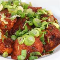 Gobi Manchurian · Veggie. Cauliflower battered, fried, and sautéed in a spicy sauce.