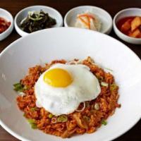 Kimchi Fried Rice · Stir Fried kimchi and fried egg. Choice of protein.