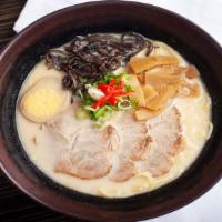 301. Tonkotsu Ramen · Milky pork bone flavor soup with sliced roasted pork, egg, bamboo stem, black fungus and gre...