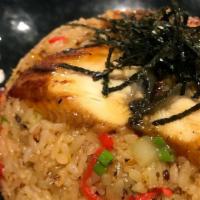 506. Unagi Fried Rice · Barbeque eel fried rice with egg, yellow and green onion.