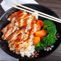512. Chicken Teriyaki Don · Grilled chicken served with house teriyaki sauce over rice.