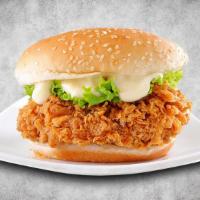 Double Crispy Chicken Burger · Double crispy chicken, mayo, buffalo sauce, lettuce, tomato, onion, and American cheese.