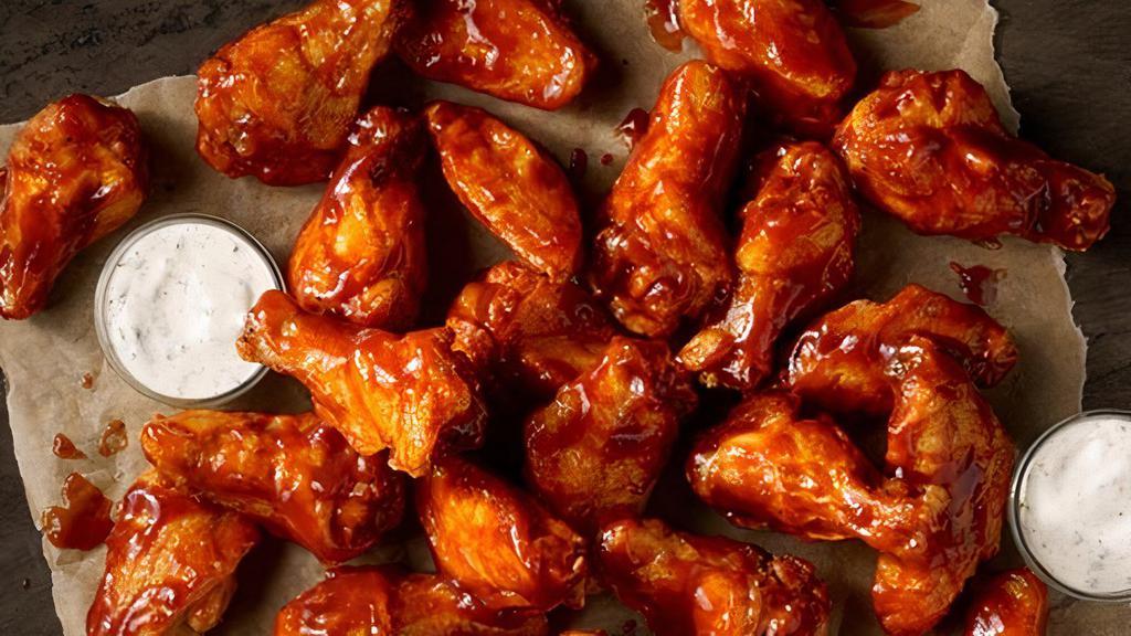 24 Ct. Wings · Traditional bone-in wings, brined & hand-tossed in your choice of sauce or rub. Choose your flavors! Served with Ranch or Bleu Cheese