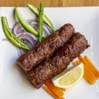 Beef Seekh Kebab · Ground beef mixed with herbs and spices and grilled on skewers.
