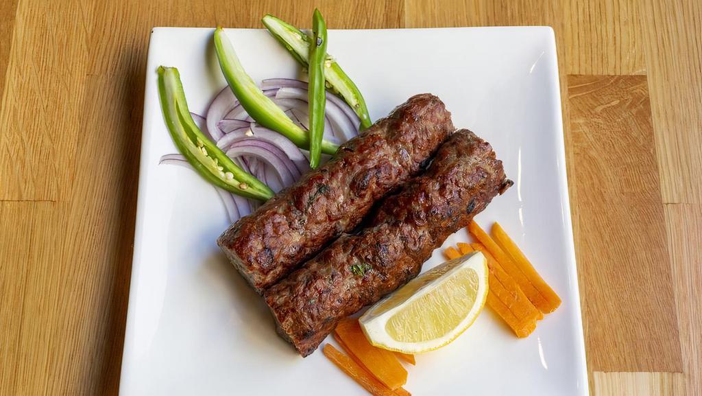 Beef Seekh Kebab · Ground beef mixed with herbs and spices and grilled on skewers.