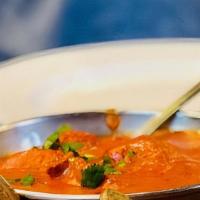 Lamb Korma · Boneless lamb cooked in mildly spiced creamy curry.