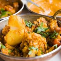 Aloo Gobi · Vegetarian. Cauliflower and potatoes are cooked with spices and herbs.