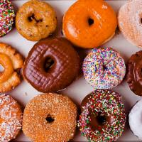 Box of Assorted Regular Donuts · An assorted mix of our raised, cake and old fashion donuts. Additional charges may apply for...