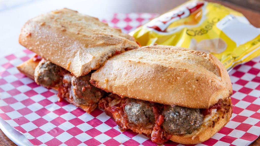 Meatball Sandwich · Marinara sauce, meatballs, parmesan and melted Mozzarella cheese on an Italian roll. Served with a bag of chips.