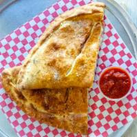Calzone · Choice of Two topping Calzone with marinara sauce and mozzarella cheese.