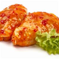Sweet & Sour Chicken Thighs · Delicious chicken thighs, tossed in Sweet and Sour sauce, and fried to crispy perfection.
