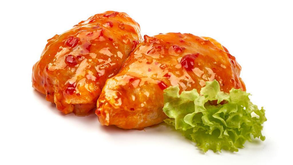 Sweet & Sour Chicken Thighs · Delicious chicken thighs, tossed in Sweet and Sour sauce, and fried to crispy perfection.