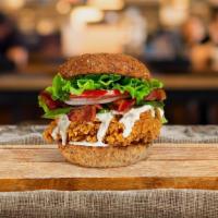 BLT Fried Chicken Sandwich · Crispy fried chicken, crispy bacon, lettuce, tomatoes, and bacon mayo. Served on a warm toas...