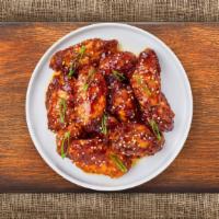 Pineapple Teriyaki Wings · (Six pieces) Fresh chicken wings fried until golden brown, and tossed in teriyaki and soy sa...