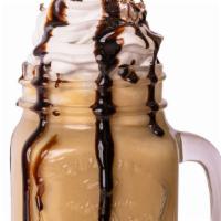 Chocolate Shake · Classic blend of chocolate ice cream and whole milk. Topped with whipped cream.