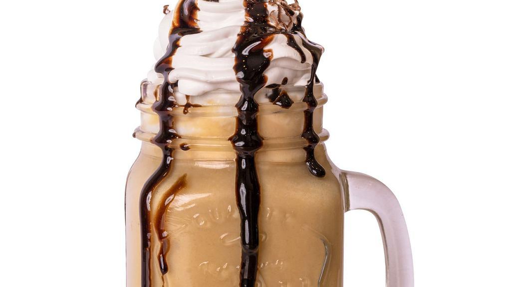 Chocolate Shake · Classic blend of chocolate ice cream and whole milk. Topped with whipped cream.