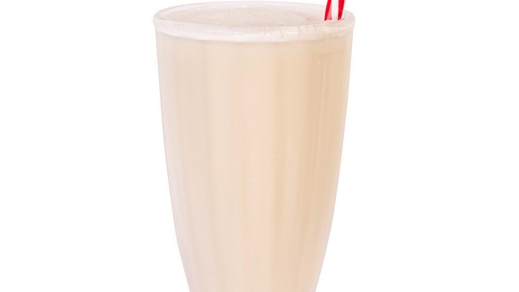 Vanilla Shake · Classic blend of vanilla ice cream and whole milk. Topped with whipped cream.
