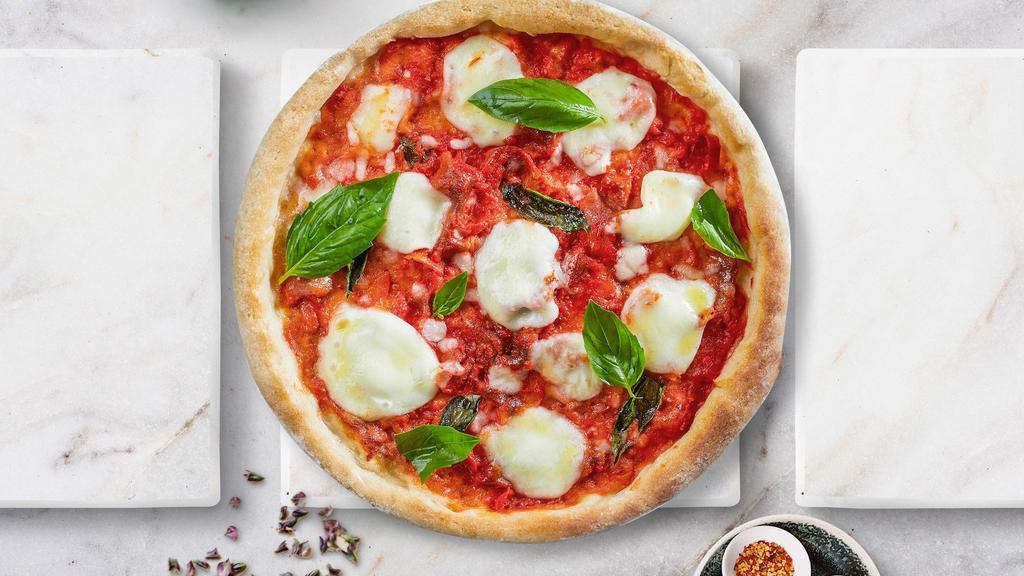 Gluten Free Margherita Pizza · Tomatoes, basil, and parmesan cheese on a gluten-free crust.