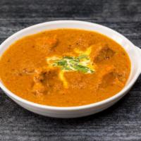 Chicken Tikka Masala · A popular village dish made from roasted marinated chicken chunks cooked in spiced tomato cu...