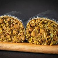 The Hungry Planet Burrito · Vegan plant protein with rice, chana garbanzo masala, and sliced onions wrapped up in a tort...