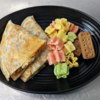 Tia's Quesadilla · Quesadilla with cheese or chicken, & a side of fryums