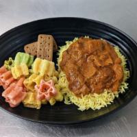 Kids Rice Bowl · Butter Chicken or Butter Paneer over Rice. *CONTAINS CASHEWS, & a side of fryums