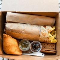 Catering Kathi Roll Box · Each box includes a kathi roll, samosa with chutneys and Indian cookies. Kathi Roll comes wi...