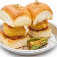Catering Vada Pav · Mashed potato fritters sandwiched between a buttered bun, garlic chutney. (Vegetarian, Serve...