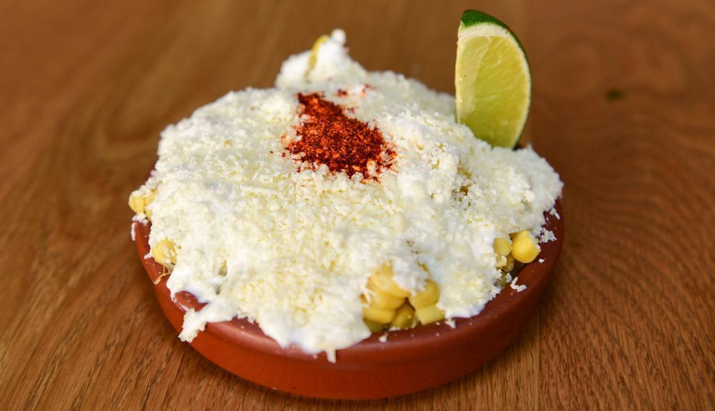 Esquite · Roasted corn, crema Mexicana, queso cotija, chile de arbol, fresh lime